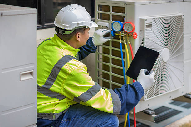 Professional Air Conditioning Repair technician working in Kingston, RI